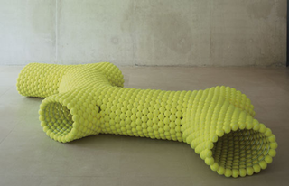 Illustration for article titled Tennis Balls Make Ballsy Benches